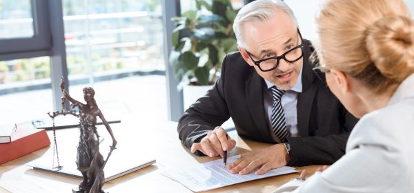 mature-serious-lawyers-discussing-business-documents-in-office.jpg mature-serious-lawyers-discussing-business-documents-in-office.jpg
